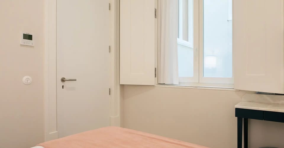 Wake gently to natural light and a calm, minimal room.