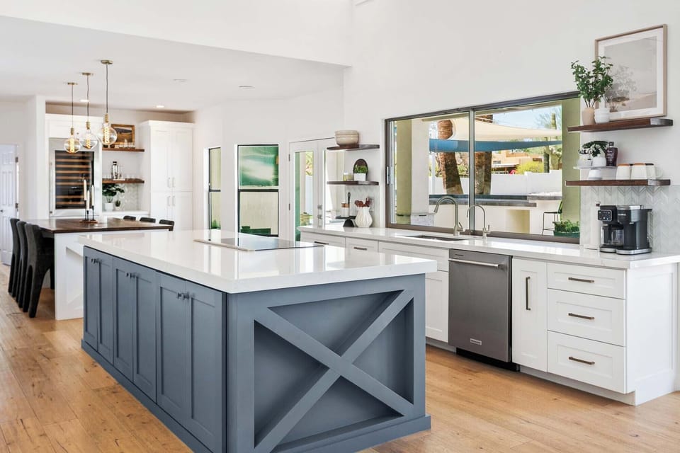 Chef's kitchen overlooking backyard