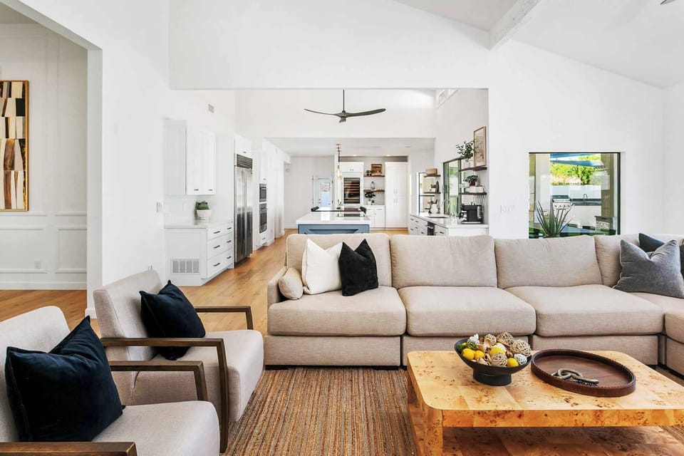 Living space opens to kitchen with gorgeous views to the backyard