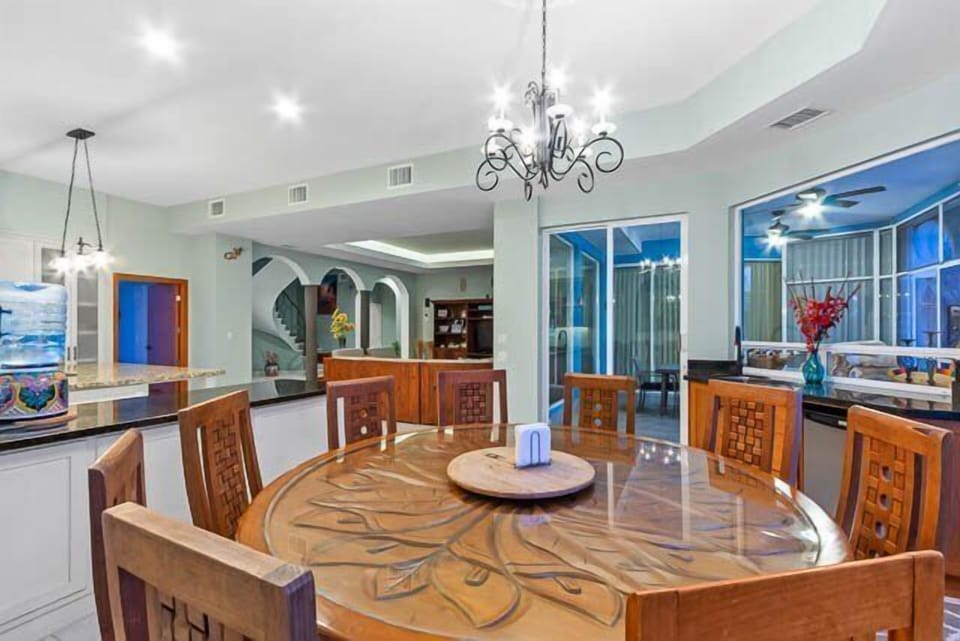 The big dining area has views of the ocean and overlooks the private pool area.