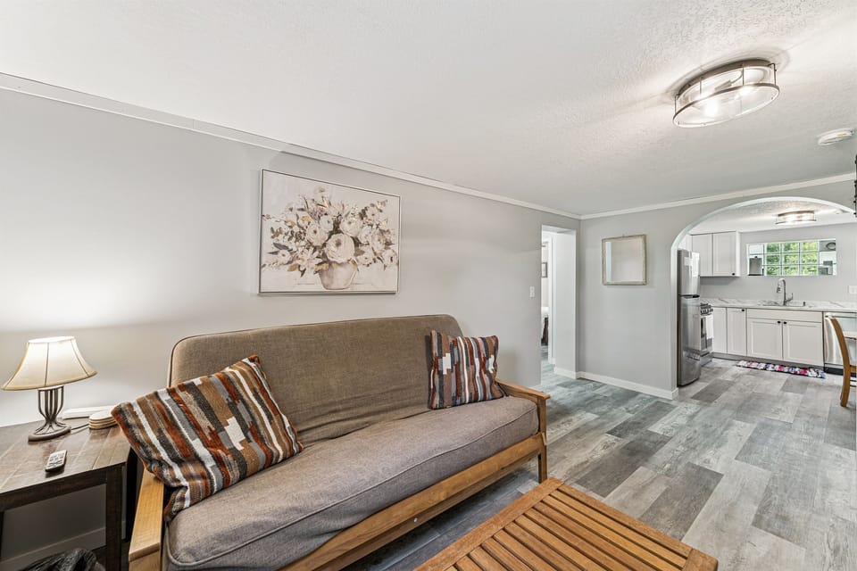 The downstairs living room has a full-sized futon with linens provided. 