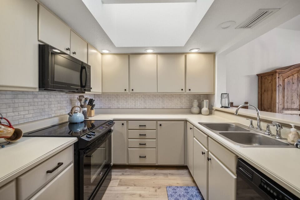 Bright and clean kitchen with new range and oven