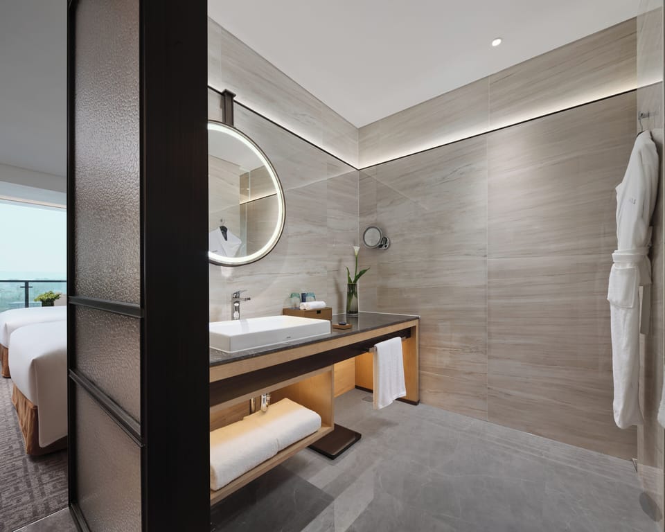 Superior Twin Room, Courtyard View | Bathroom | Free toiletries, hair dryer, slippers, towels