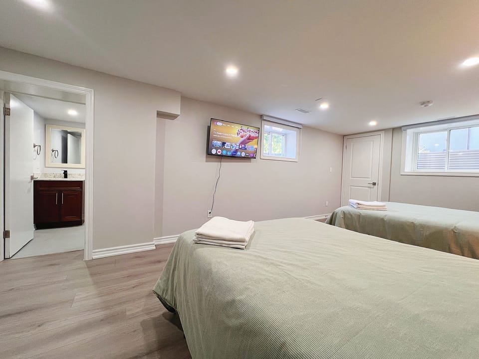 Deluxe Quadruple Room, 2 Double Beds, Private Bathroom | Desk, laptop workspace, blackout drapes, soundproofing