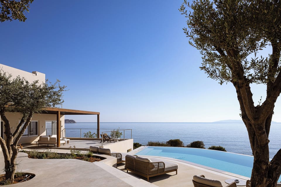 Perched above the sparkling sea on the north coast of Crete, in the charming village of Palaiokastro, our stunning In Blue Villa features 5 bedrooms, comfortably accommodating up to 10 guests.