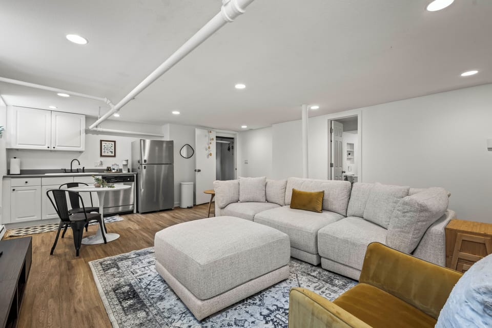Sleek style with cozy cushions in the basement living room