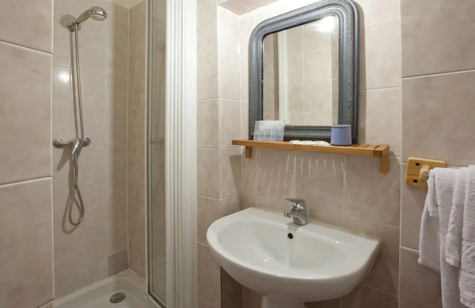 Shower, free toiletries, hair dryer, towels