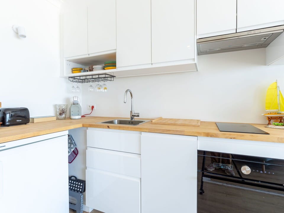 Kitchen, Countertop, Kitchen Appliance, Flooring, Cabinetry, Interior Design, Major Appliance, Wood, Furniture, Floor