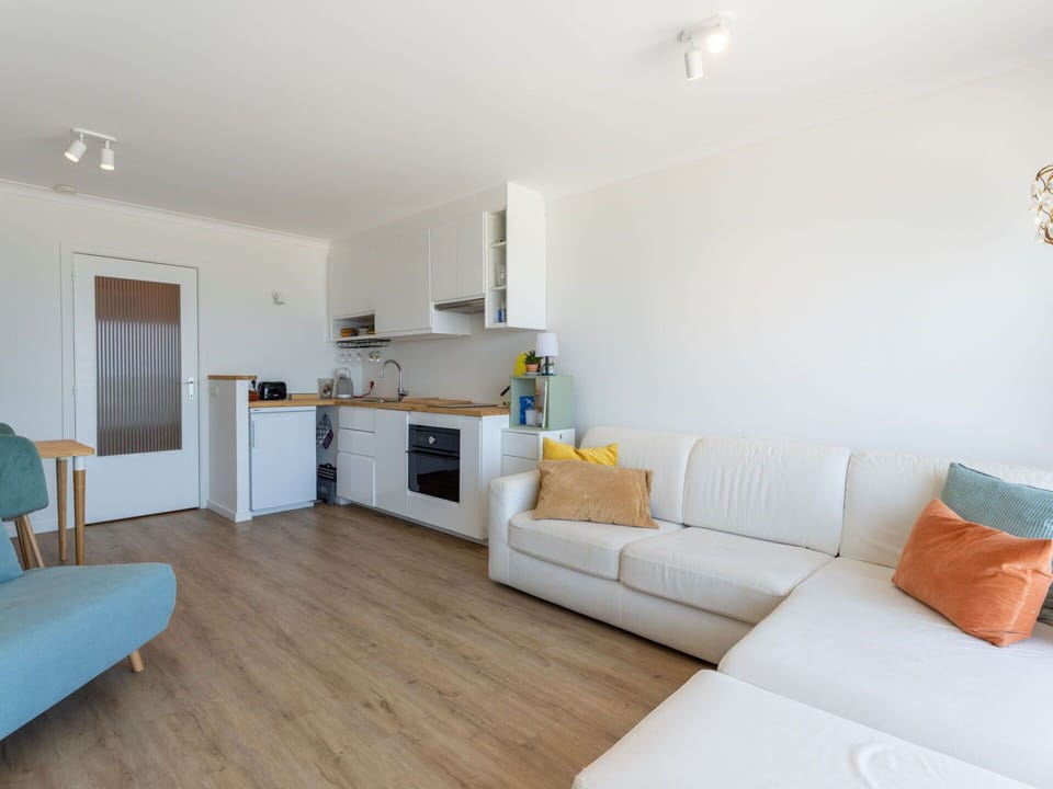 Furniture, Wood, Interior Design, Apartment, Flooring, Floor, Couch, Room, Wood Flooring, Living Room