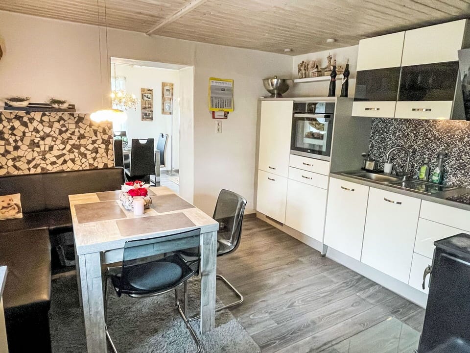 Furniture, Interior Design, Wood, Flooring, Floor, Room, Ceiling, Kitchen, Home, Chair