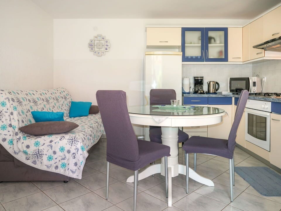 Furniture, Interior Design, Flooring, Floor, Room, Textile, Lighting, Table, Home, Apartment