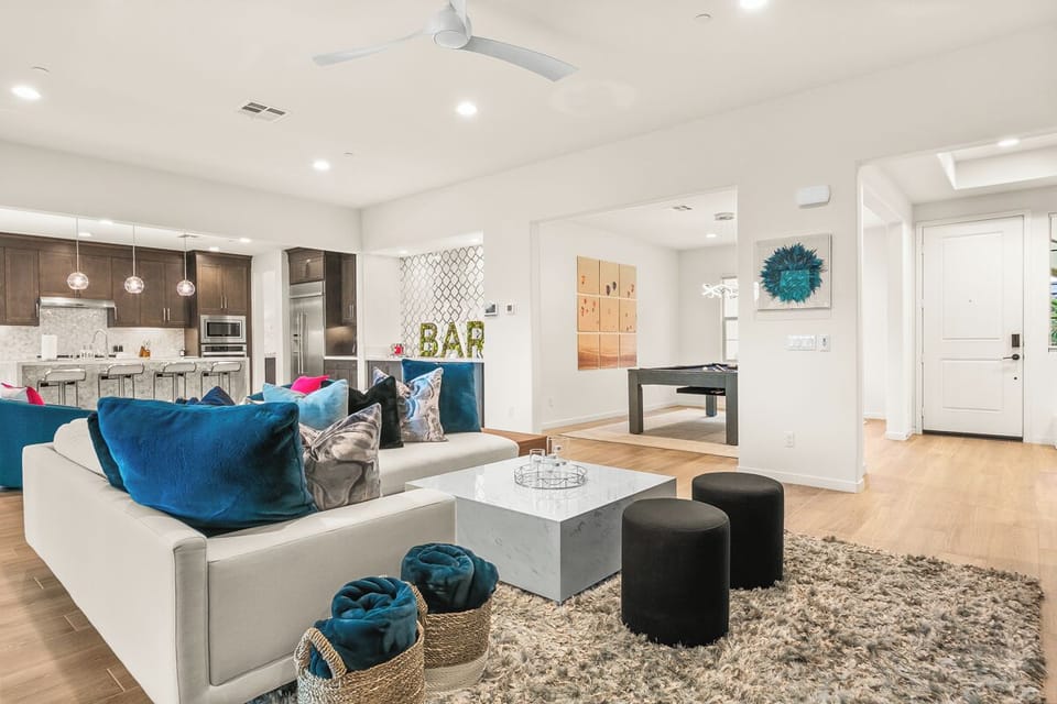 Sprawling main living space with pool table, bar, and room to spread out.