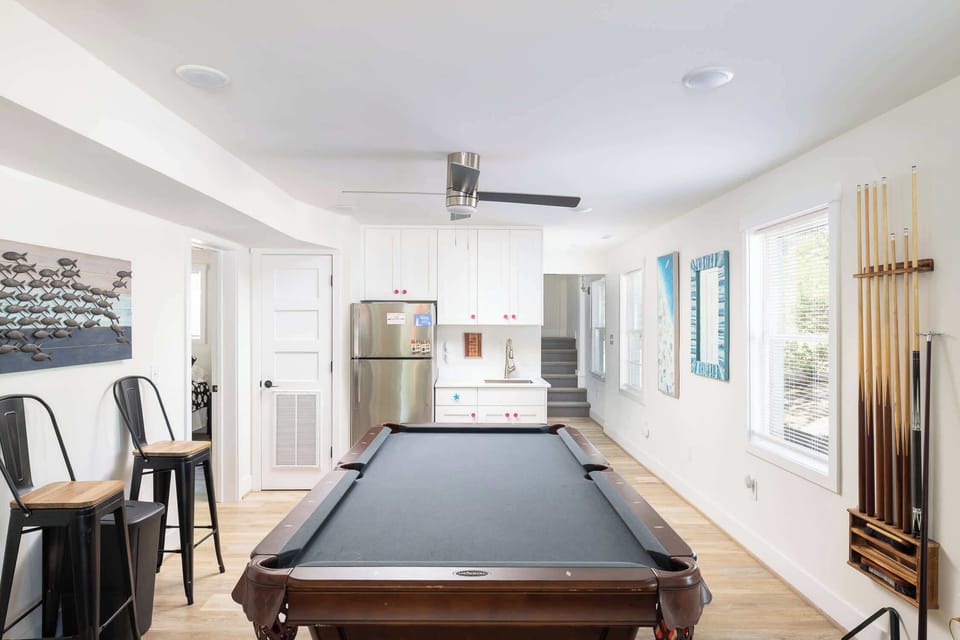 Lower Level: Rec Room w/ Pool Table, Comfy Seating, Smart TV, and Ceiling Fan