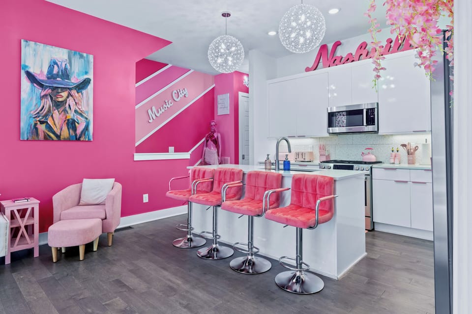 Pink kitchen bar — pour the bubbly and let the pregame begin.