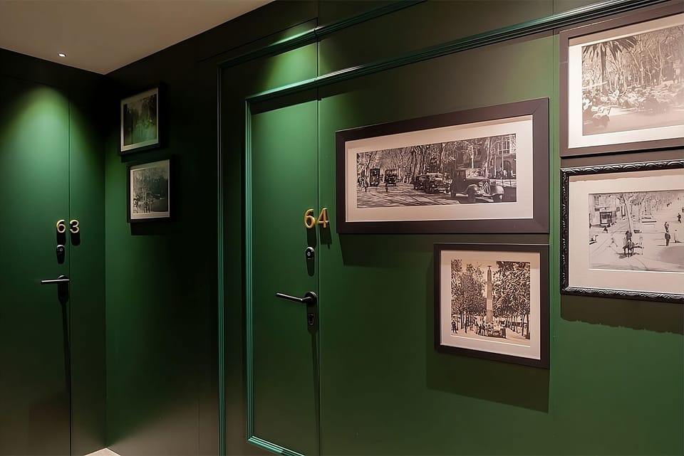 Find your room easily in a quiet, design-forward corridor.