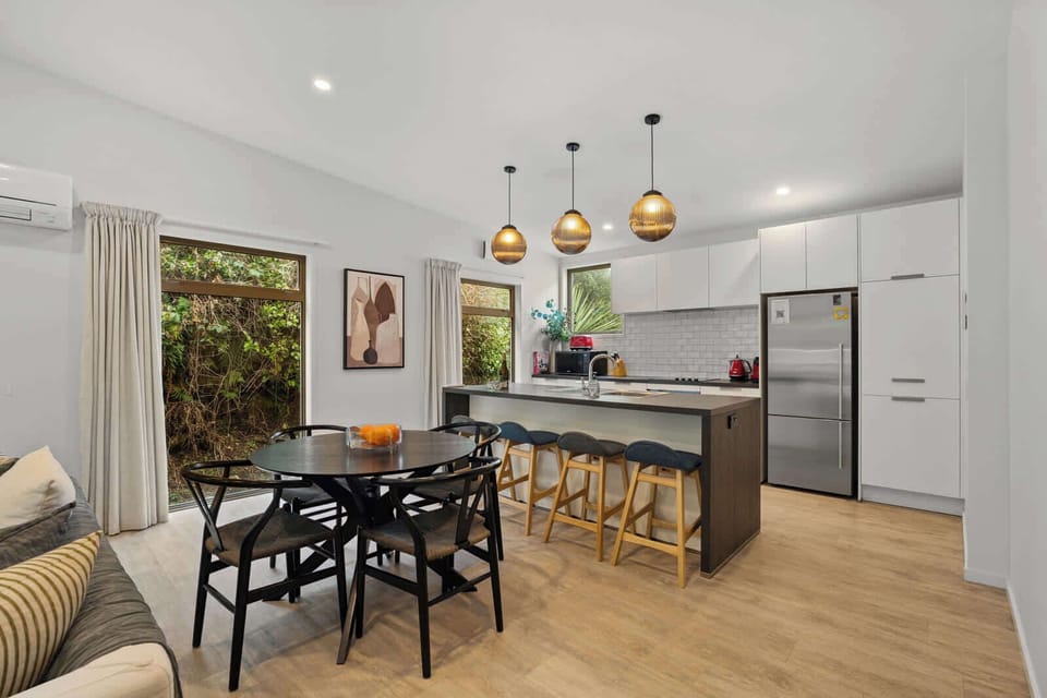 Stylish kitchen with breakfast bar and modern appliances