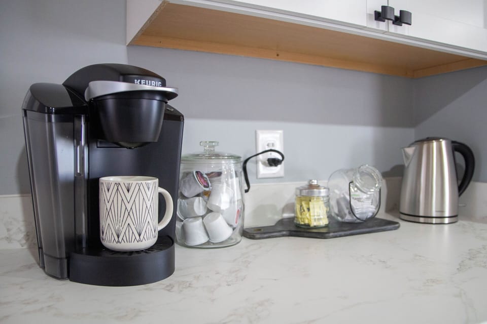 Coffee bar, complementary pods & tea provided