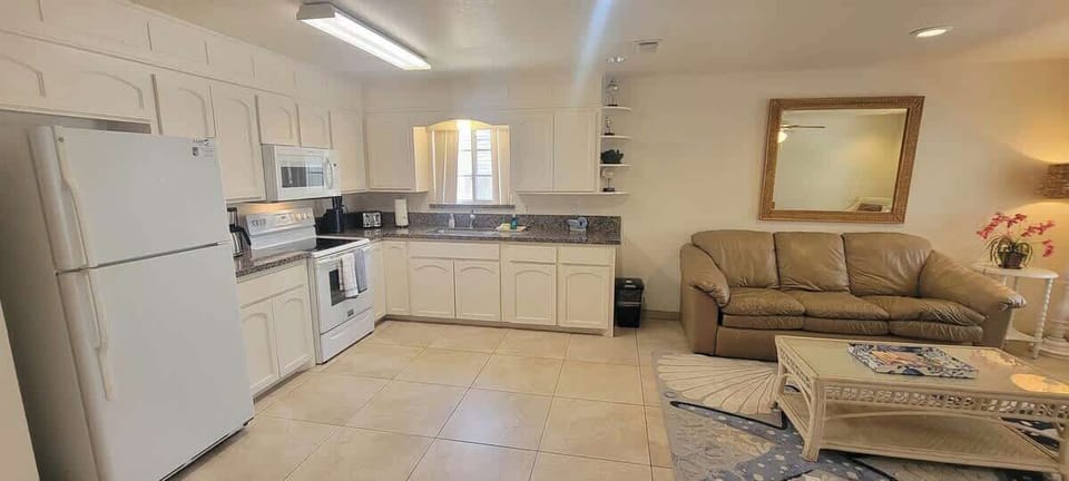 Condo, Multiple Beds, Patio, Pool View (Campeche Retreat #12) | Living area | 42-inch flat-screen TV with digital channels