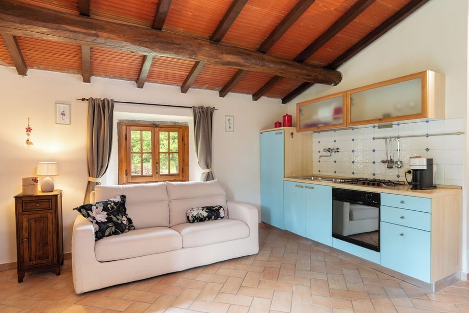 Villa, Garden View | Living area | 32-inch TV with satellite channels