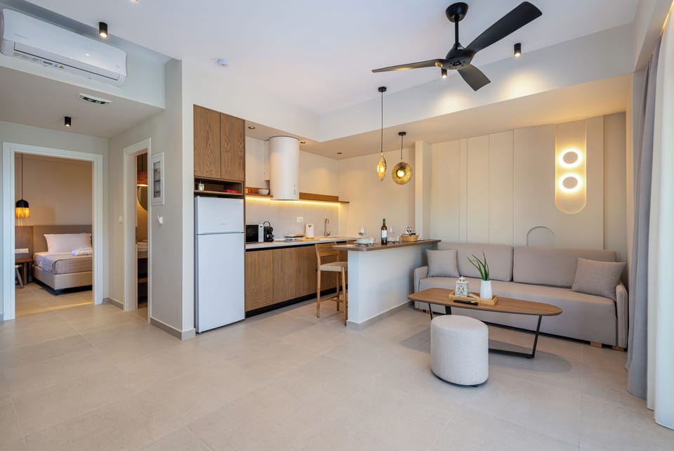 Superior Apartment, Sea View, Ground Floor | Living area | TV