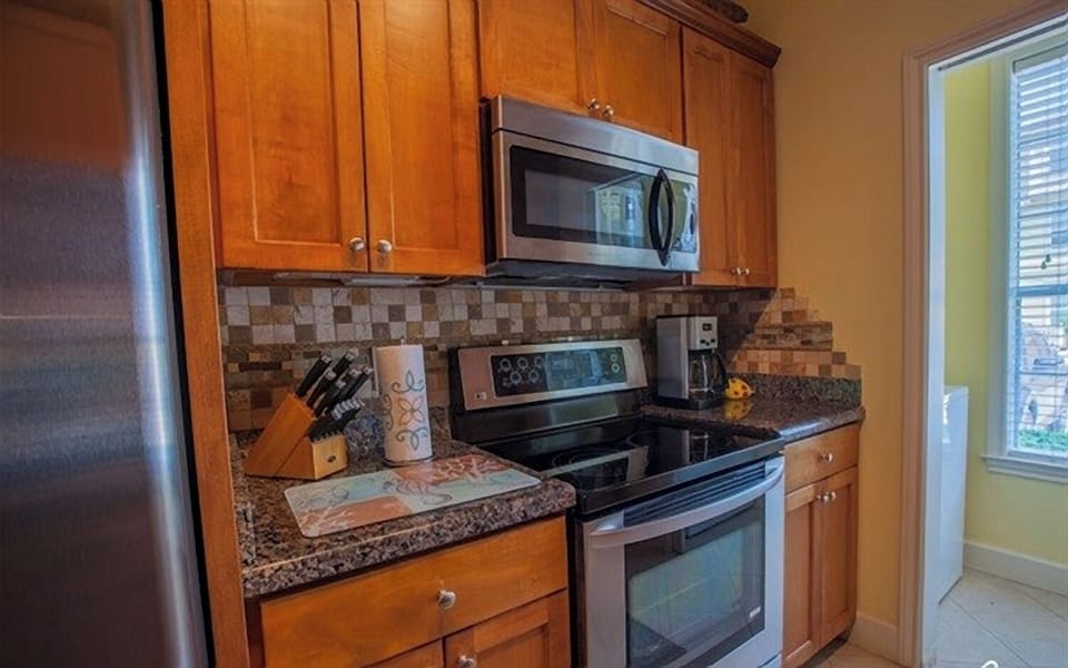 kitchen with stove and microwave