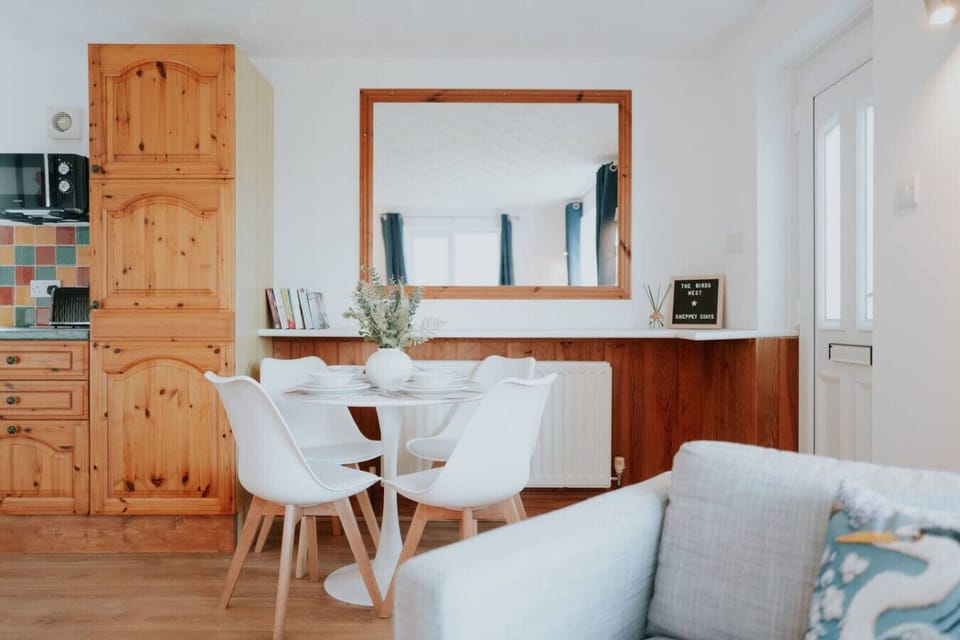 “Bright mornings, cosy dinners, unforgettable moments.” – our dining space is perfect for lingering over breakfast, sharing laughs, and making memories.