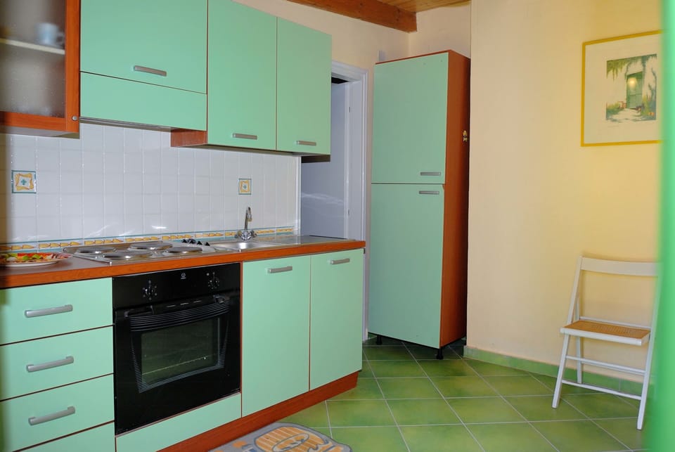 Family Apartment, 2 Bedrooms | Private kitchen | Fridge, oven, stovetop, espresso maker