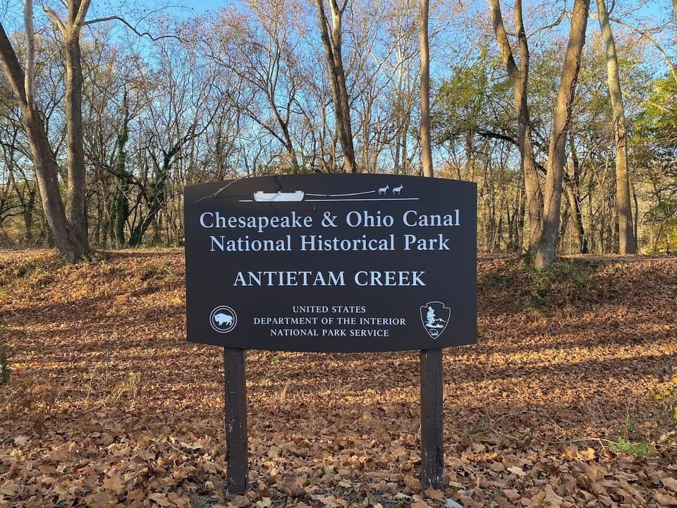 “Chesapeake & Ohio Canal National Historical Park, Antietam Creek”.  This sign is less than 1/2 mile from the Dome, & the C&O is a National Park. 