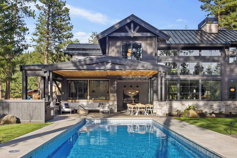 Sun, swim, and dine—your private resort with pool, spa, and covered lounge.
