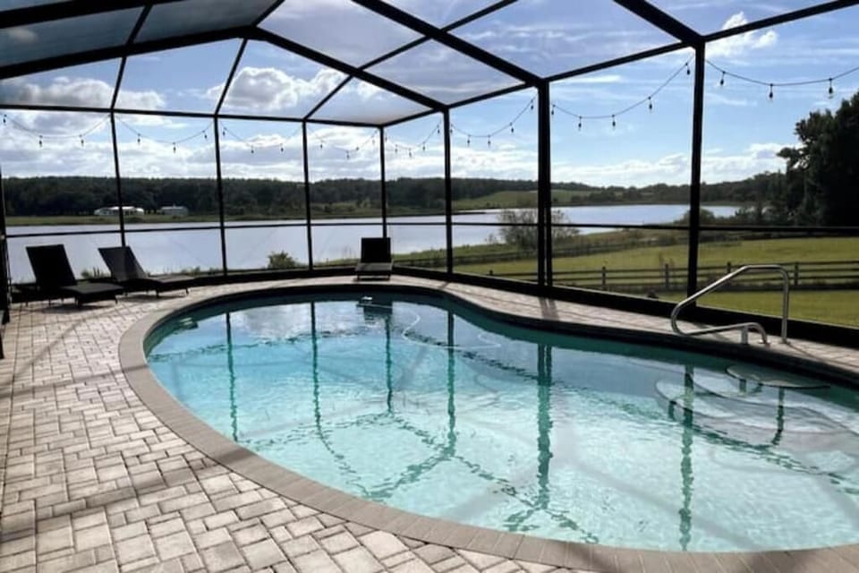 Stunning lake views from the pool. Pool can be heated on request for a small fee