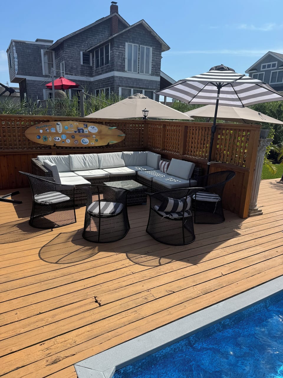 Lounging  areas surround the pool and bar area. Ideal setting to entertain.
