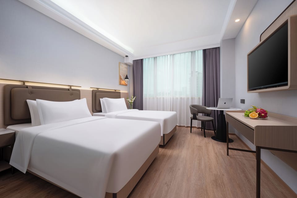 Superior Twin Room, City View | Desk, laptop workspace, blackout drapes, soundproofing