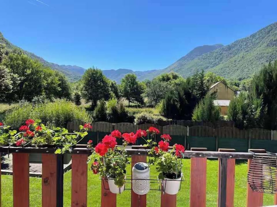 View of gardens and mountains from front balcony of sitting room and bedroom 1