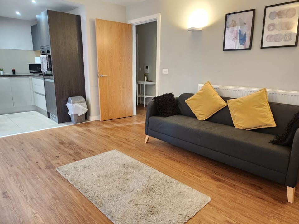 Classic Apartment, Courtyard View | Living area | Flat-screen TV