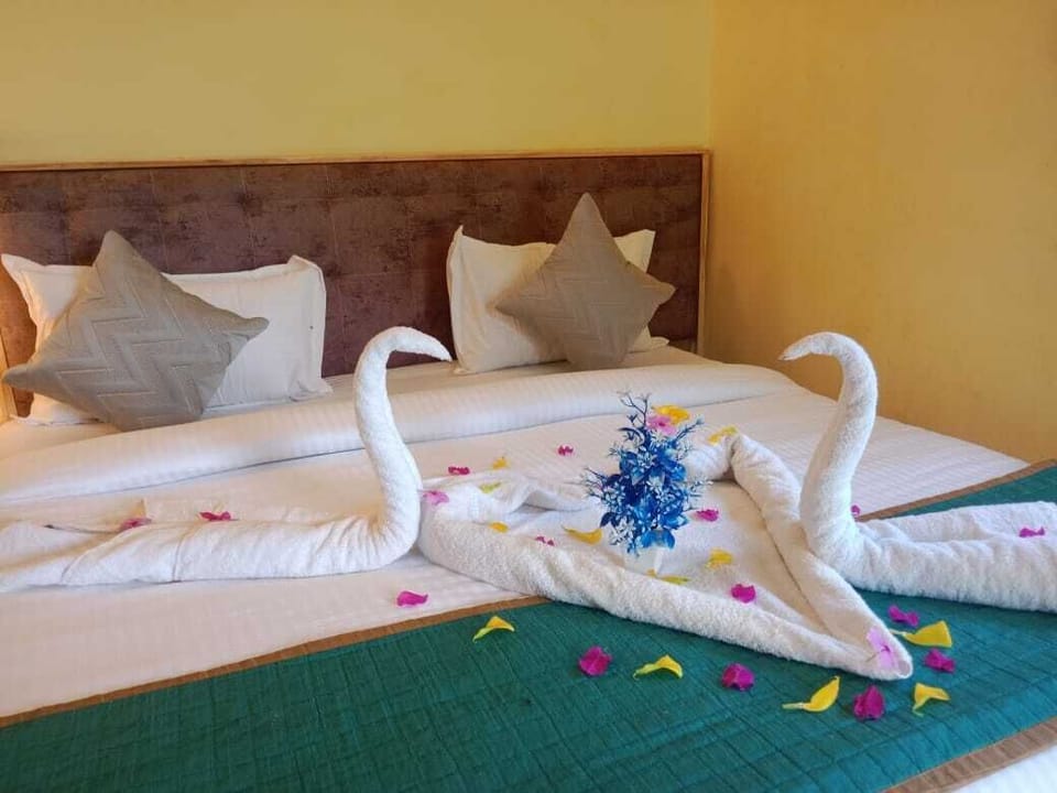 Deluxe Double Room, Patio, Garden View | Bathroom | Shower, free toiletries, hair dryer (on request), slippers