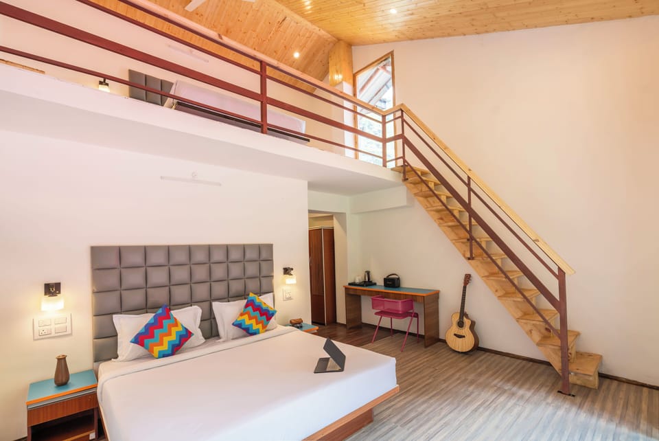 Deluxe Private Quadruple Room with Balcony & Mountain View and Ensuite Bathroom | Laptop workspace, free WiFi