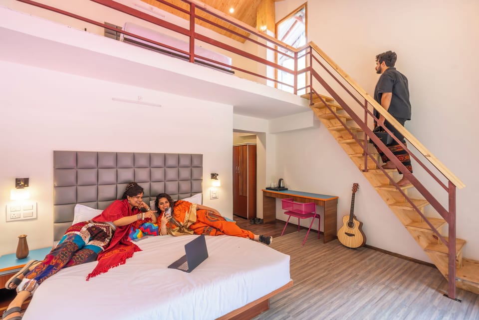 Deluxe Private Quadruple Room with Balcony & Mountain View and Ensuite Bathroom | Laptop workspace, free WiFi