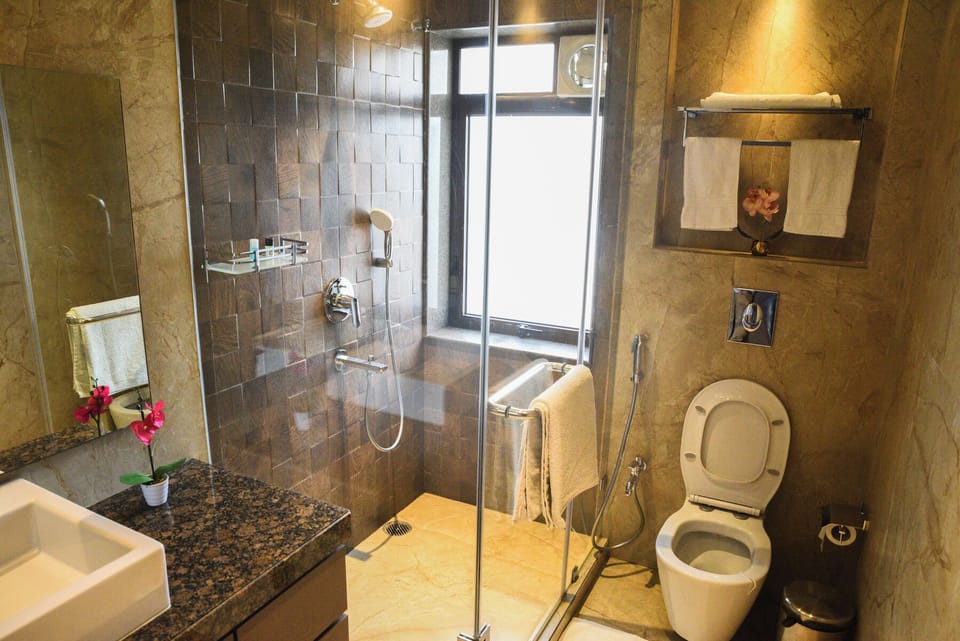 Deluxe Suite | Bathroom | Slippers