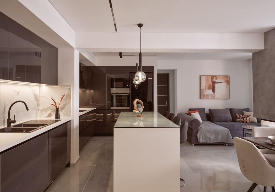 Seamless design meets functionality in this fully equipped kitchen.