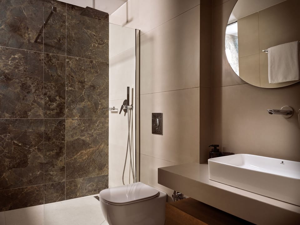 Refresh in style with walk-in showers and calming design.