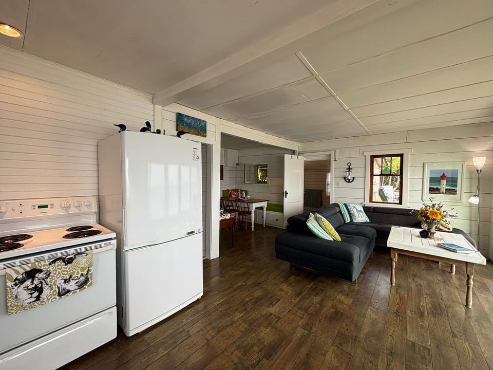 Comfortable seating flows into the kitchen for easy gatherings.