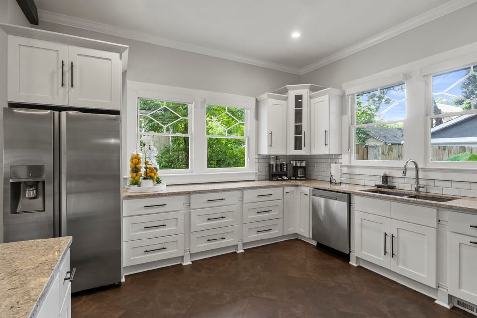 Fully equipped kitchen with stainless appliances and ample prep space