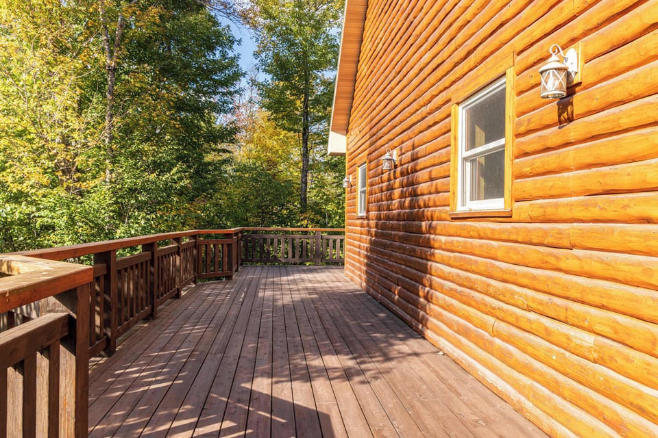 Wrap-around deck with plenty of room to unwind, grill out, and take in the sights and sounds of the UP woods