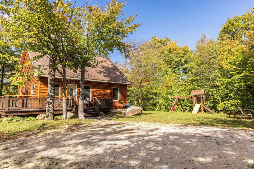 The cabin tucked into the UP tree line, a private retreat surrounded by nature, with Grand Marais & Pictured Rocks just down the road