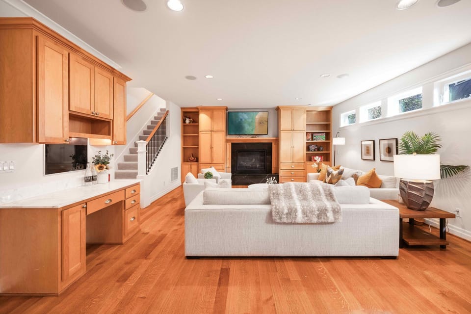 Warm living space with fireplace - the heart of this welcoming home.