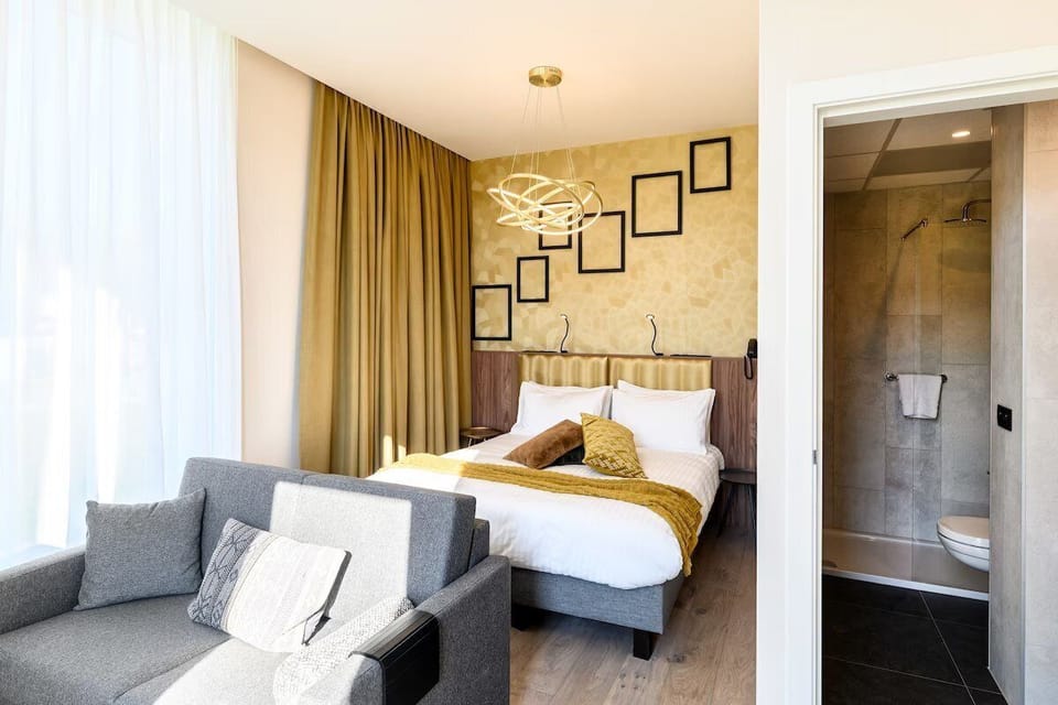 Kick back in a studio-style room with sofa comfort.