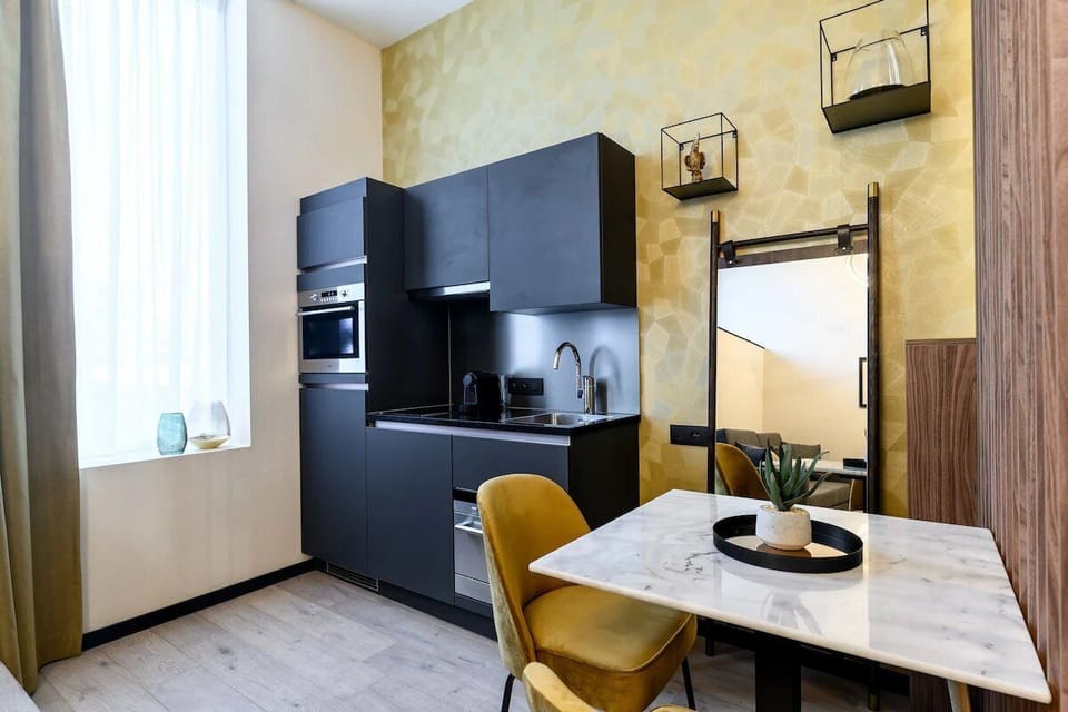 Cook with ease in the modern kitchenette and bright dining corner.
