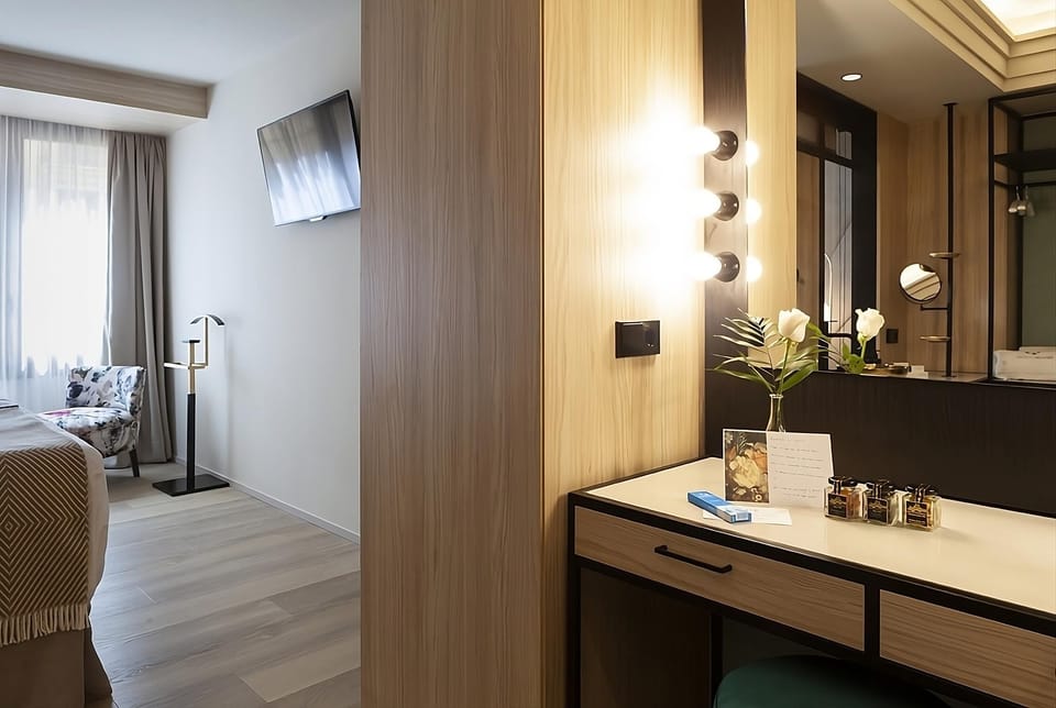 Refresh at the chic vanity, then lounge in total comfort.