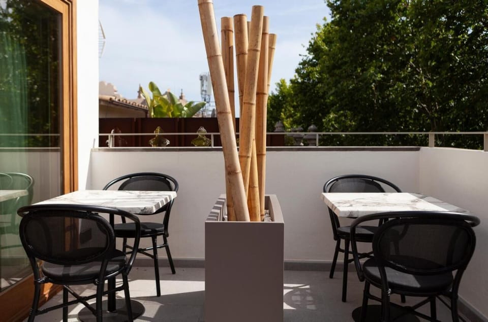 Start mornings outside with coffee at sunlit bistro tables.