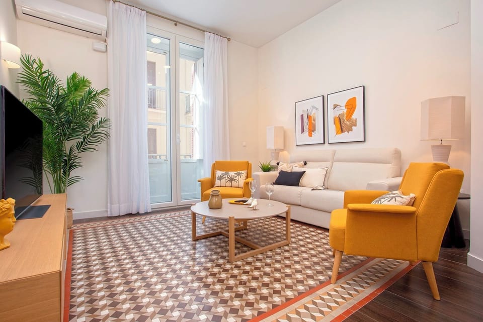 Apartment (2 Bedrooms) | Living area | 52-inch Smart TV with satellite channels